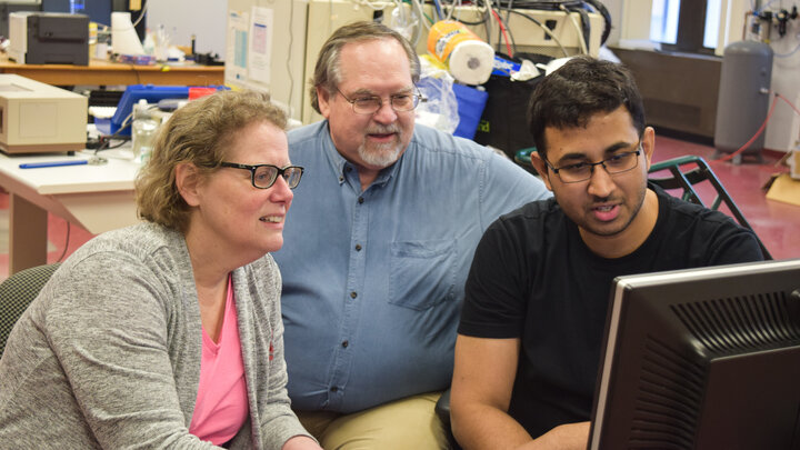 Dr. Martha Morton and Dr. James Takacs join Suman Chakrabarty in the lab
