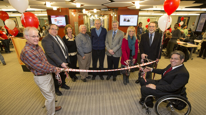 The Department of Chemistry celebrated the remodeling of Hamilton Hall's second floor chemistry laboratories and new resource center with a ribbon cutting. From left: Mark Griep, Dr. Jim Takacs, Peg Bergmeyer, Darrel Kinnan, Jim Carr, Jason Kautz, Alecia Kimbrough, Dan Hoyt and Lance Perez.