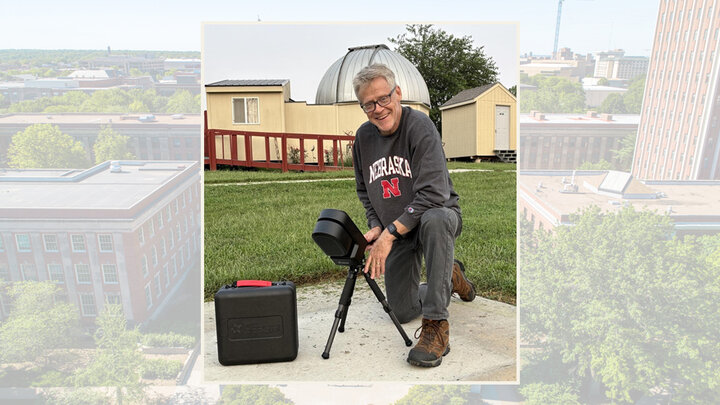 Jody Redepenning with his telescope